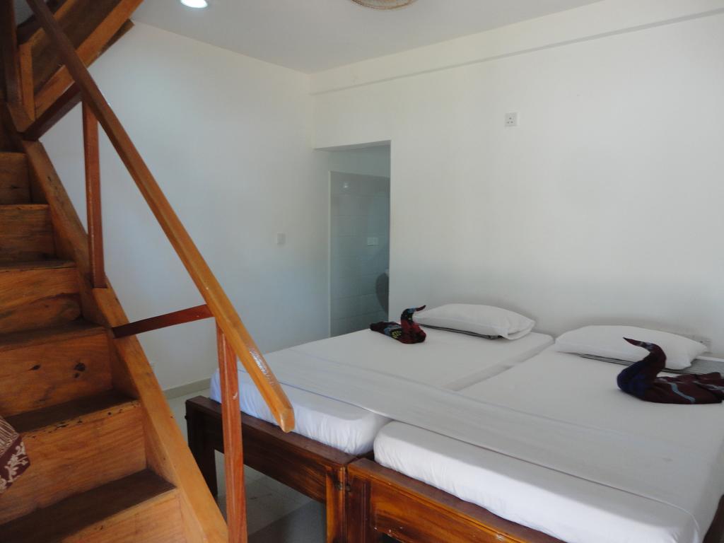 Yoho Hotel Arugambay Beach Inn 阿鲁甘湾 客房 照片