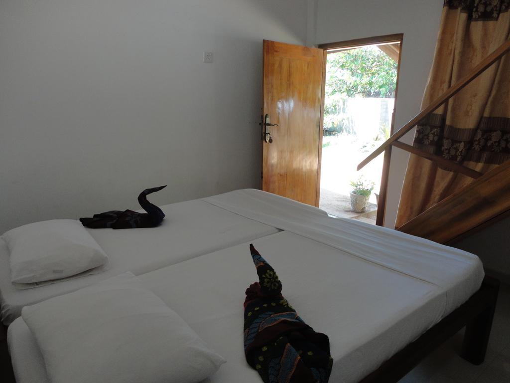 Yoho Hotel Arugambay Beach Inn 阿鲁甘湾 客房 照片